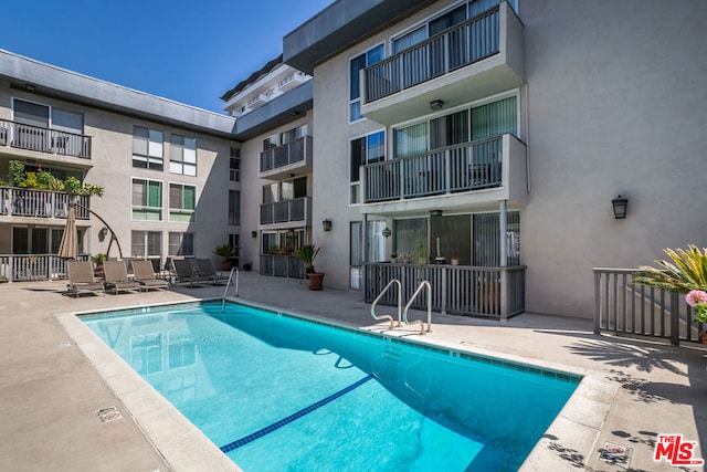 view of pool with a patio area