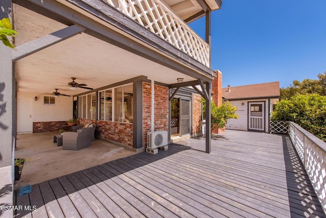 deck with ac unit, ceiling fan, and an outdoor hangout area