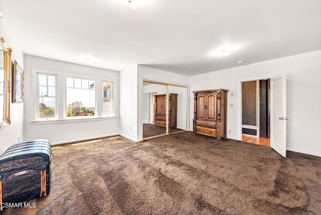 carpeted bedroom featuring a closet