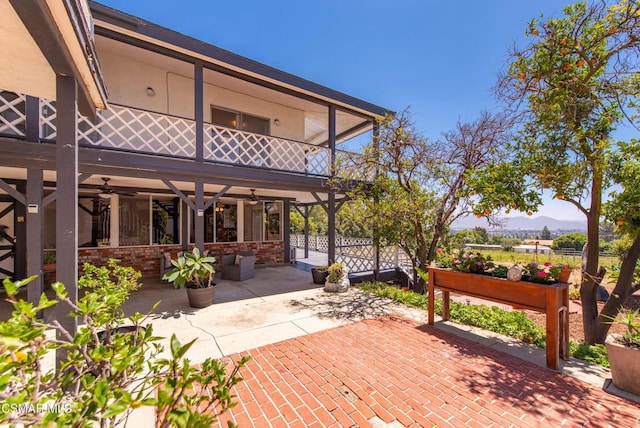 view of patio / terrace with a balcony