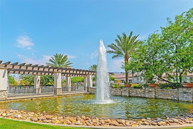 view of home's community featuring a water view