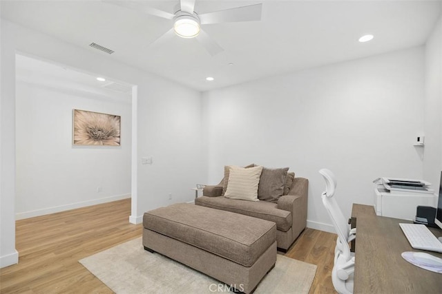 interior space featuring ceiling fan and light hardwood / wood-style floors