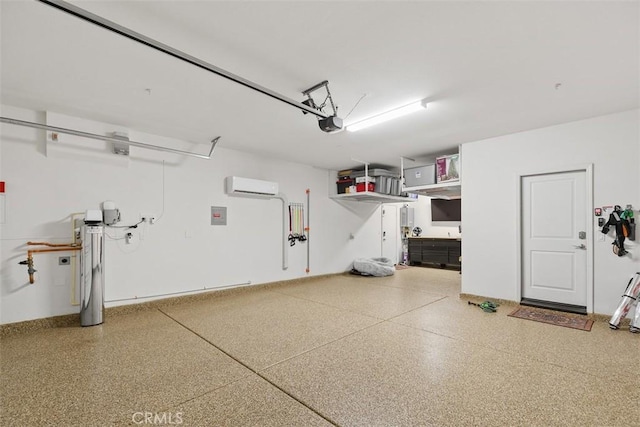 garage with a wall mounted air conditioner and a garage door opener