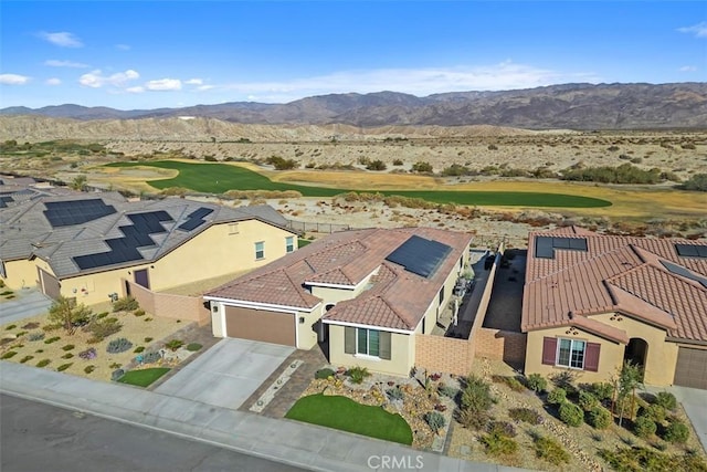 drone / aerial view featuring a mountain view