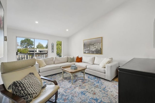 living room with lofted ceiling