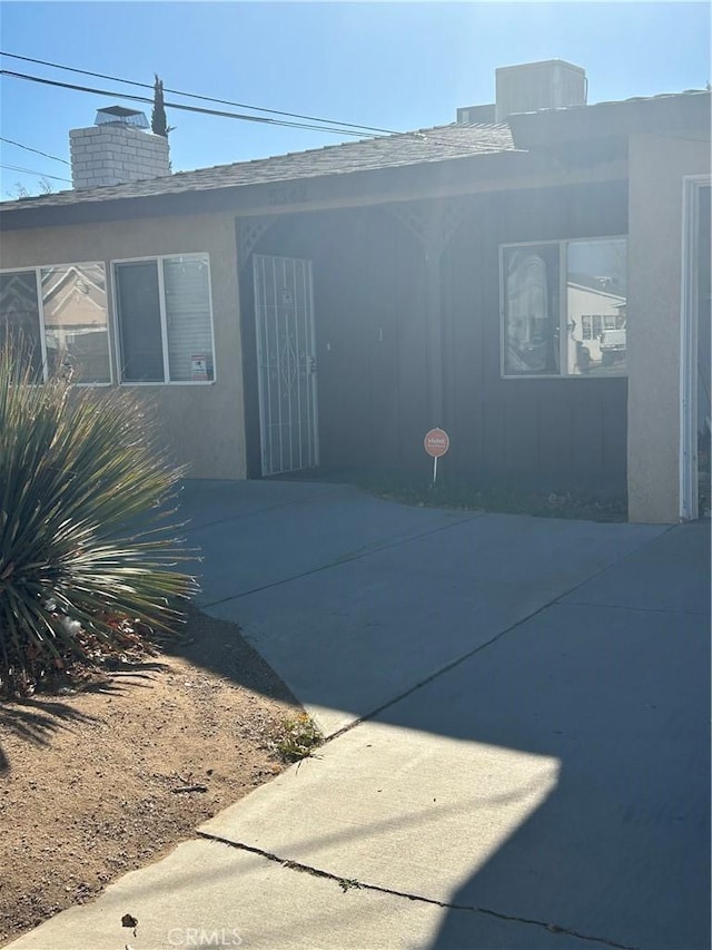 entrance to property with a patio area