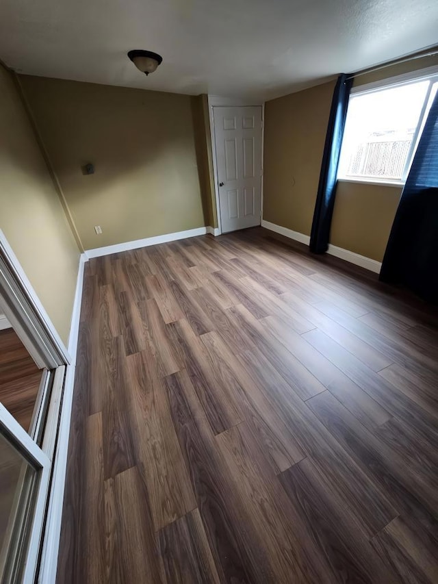 unfurnished room featuring hardwood / wood-style floors