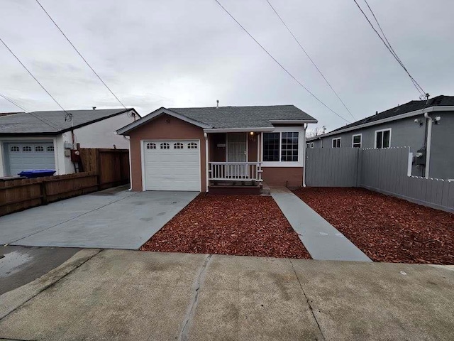 single story home featuring a garage