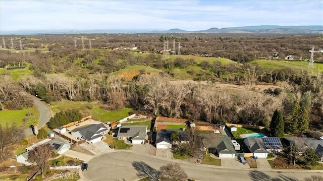 drone / aerial view featuring a mountain view and a residential view