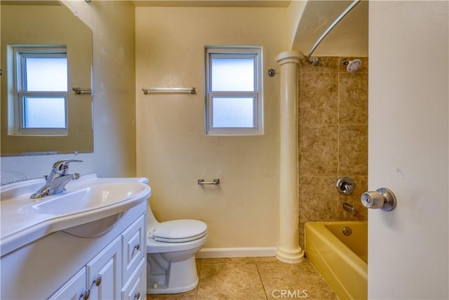 full bathroom featuring vanity, tile patterned floors, tiled shower / bath, toilet, and ornate columns