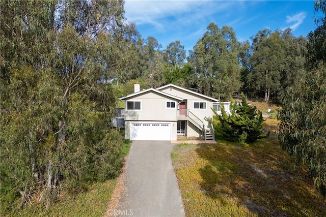 view of front of home with a garage