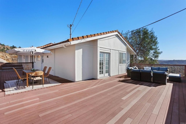 deck featuring an outdoor living space