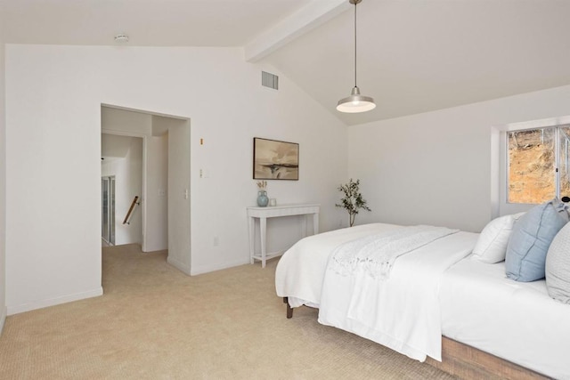 carpeted bedroom featuring lofted ceiling with beams