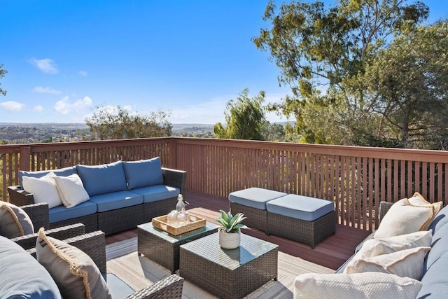 wooden deck with an outdoor hangout area