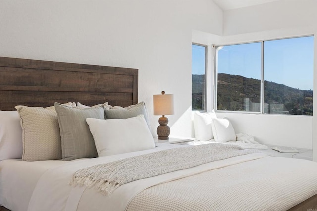 bedroom with a mountain view