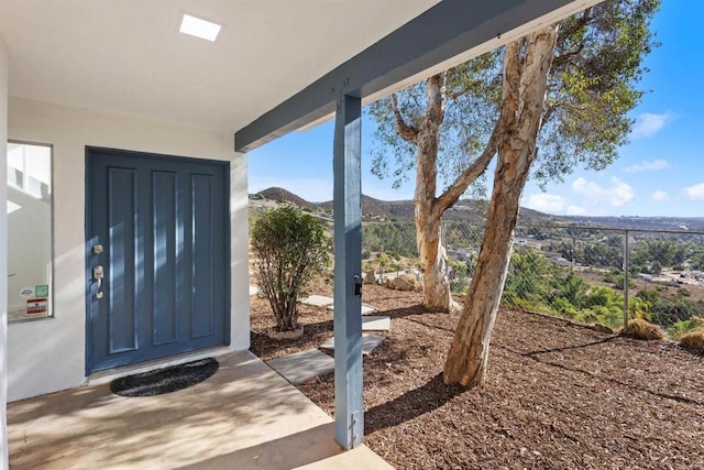 entrance to property with a mountain view