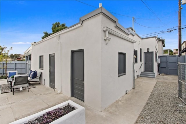 rear view of property with a patio