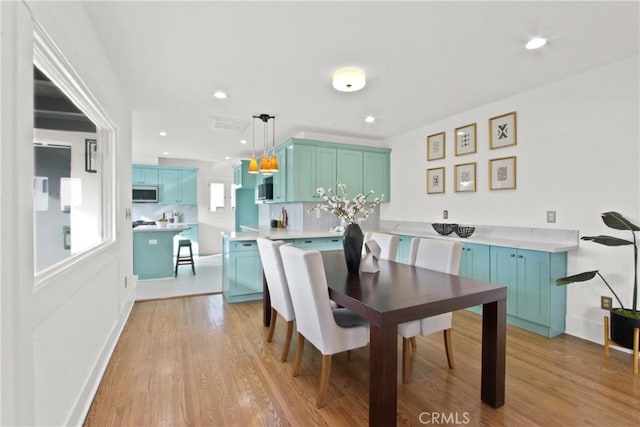 dining area featuring light hardwood / wood-style flooring