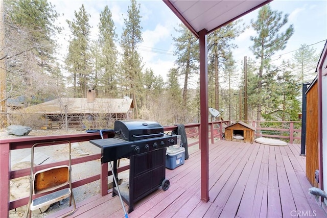 wooden deck with area for grilling