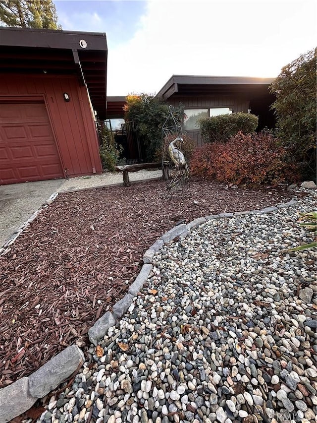 view of yard featuring a garage