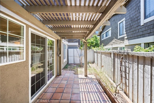 view of patio featuring a fenced backyard and a pergola