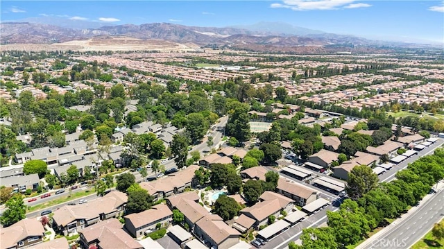 bird's eye view featuring a residential view and a mountain view