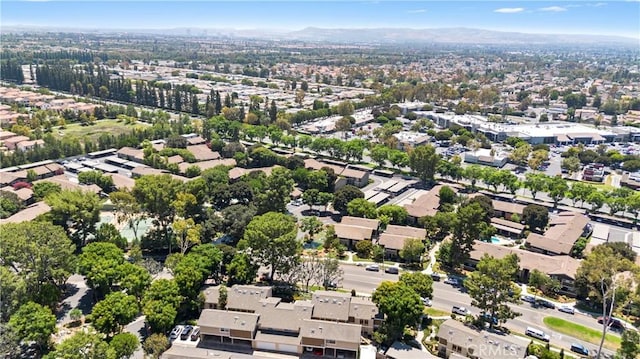 birds eye view of property featuring a mountain view and a residential view