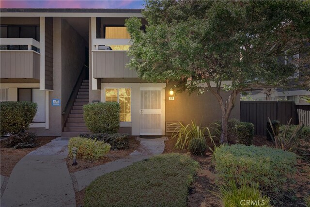 doorway to property featuring a balcony