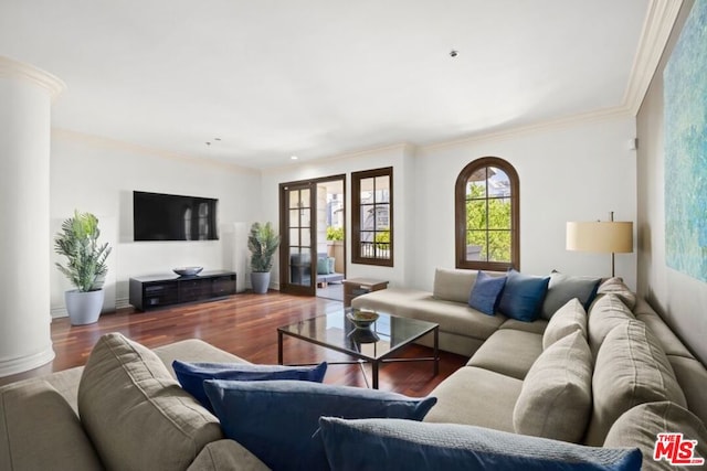 living room featuring crown molding, dark hardwood / wood-style flooring, and french doors