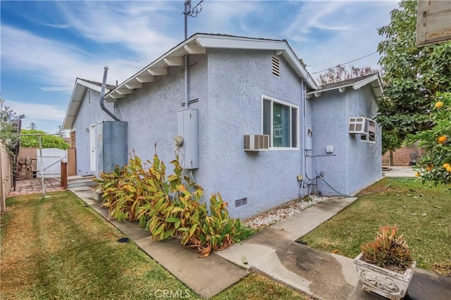 view of property exterior featuring a yard