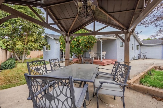 view of patio with a gazebo and a wooden deck