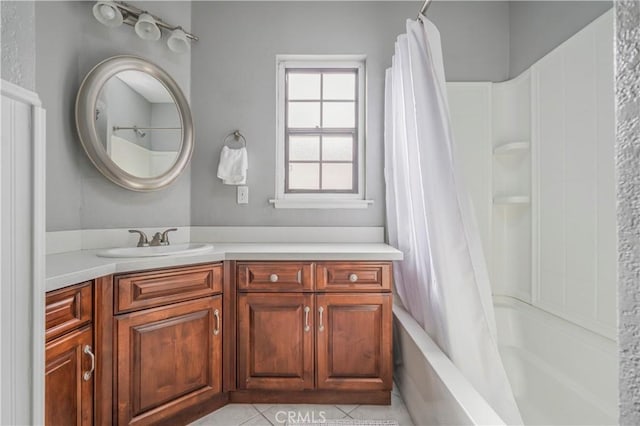 bathroom featuring tile patterned floors, vanity, and shower / tub combo with curtain