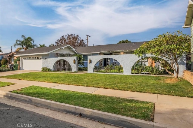 ranch-style house with a garage and a front yard