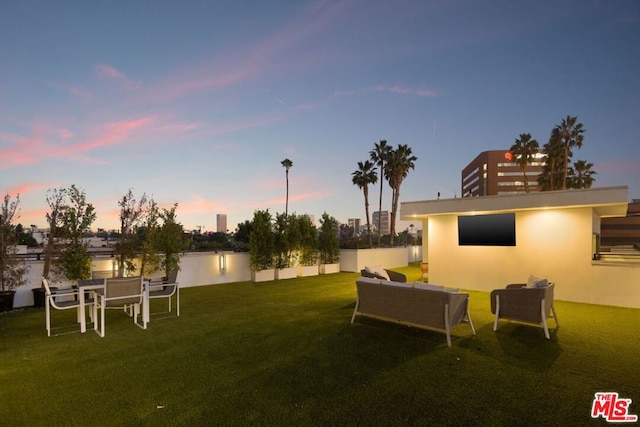 yard at dusk with a water view