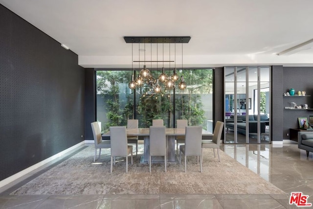 dining area featuring expansive windows