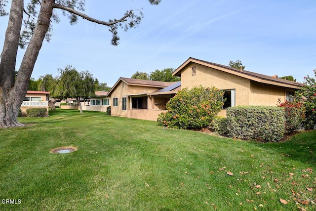 exterior space featuring a lawn