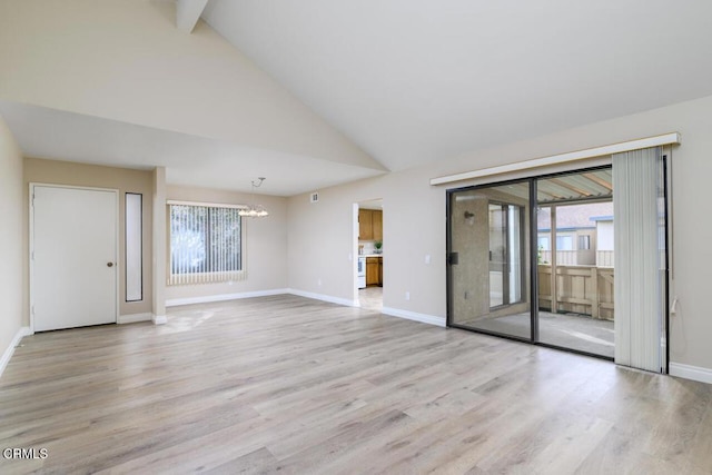 unfurnished living room with beamed ceiling, light hardwood / wood-style floors, high vaulted ceiling, and a chandelier