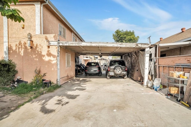 view of parking with a carport