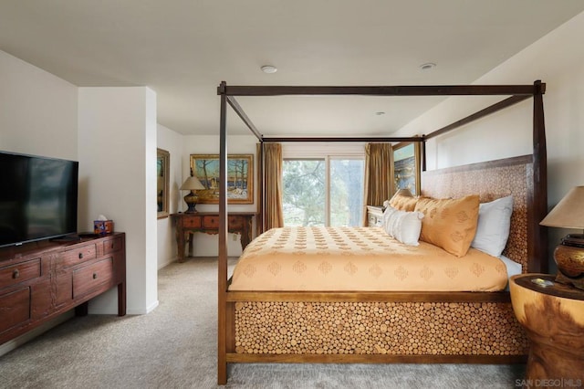 bedroom with light colored carpet