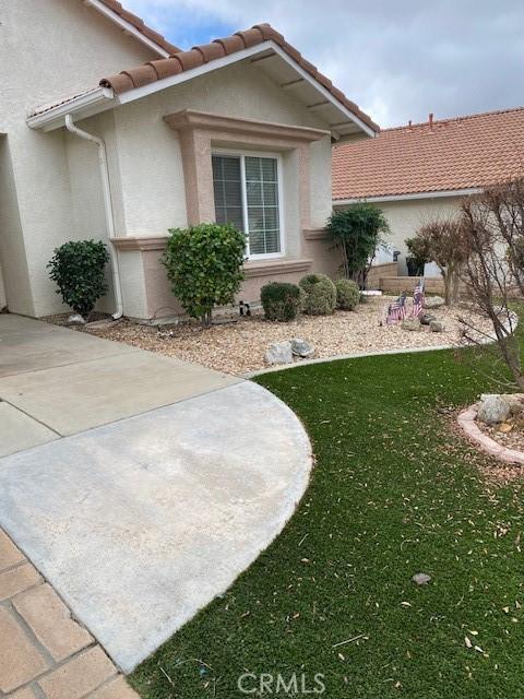 view of home's exterior featuring a lawn