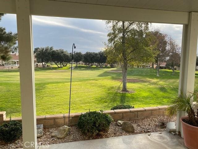 view of home's community featuring a lawn