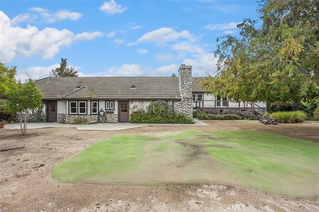 exterior space with a front yard