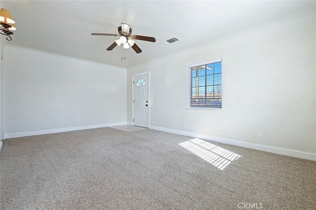 unfurnished room featuring carpet floors and ceiling fan