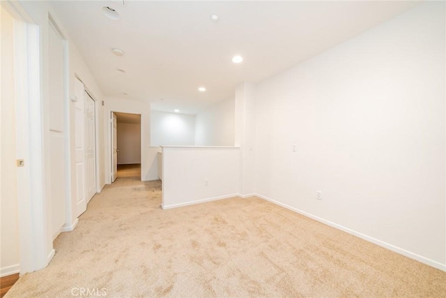 41985 Davenport Way Unit B, Murrieta, CA 92562 - unfurnished room featuring baseboards, recessed lighting, and light carpet