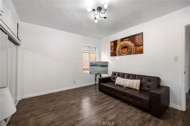 living room with dark hardwood / wood-style floors