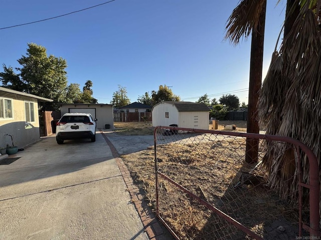 view of front of home featuring a storage unit