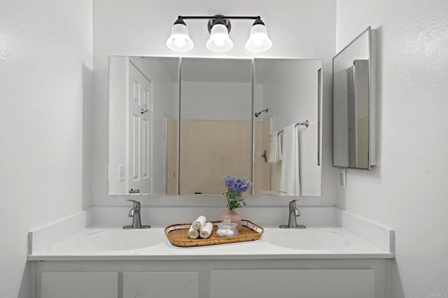 full bath featuring double vanity