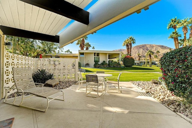 view of patio with a mountain view