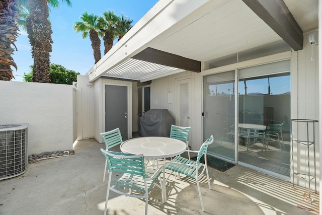 view of patio featuring area for grilling and central air condition unit