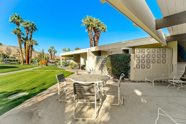 view of patio with a mountain view